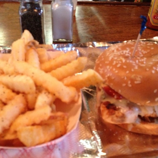 Photo taken at MoJoe&#39;s Burger Joint by Jamil S. on 6/25/2013