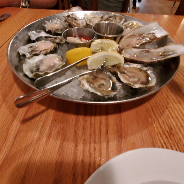 Photo taken at Hank&#39;s Oyster Bar by Chris F. on 7/14/2019