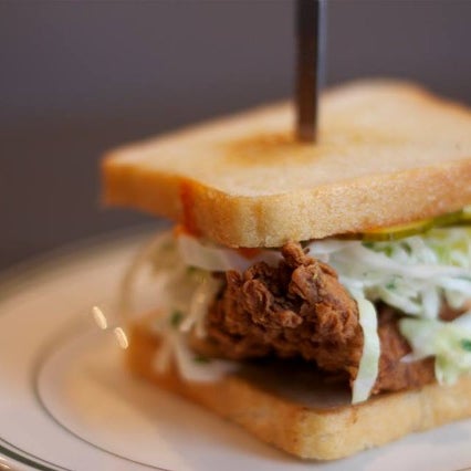 One of the most popular items is their fried chicken sandwich, a juicy crispy buttermilk-brined breast topped with sour and sweet pickles, bright slaw, and homemade hot sauce.