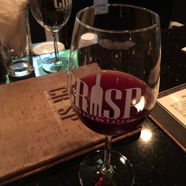 Photo taken at Crisp Wine-Beer-Eatery by Samantha S. on 12/28/2014