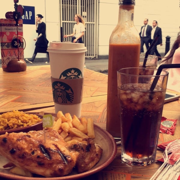 Photo taken at Nando&#39;s by N on 8/12/2015