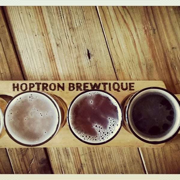Photo taken at Hoptron Brewtique by Samantha V. on 8/14/2016