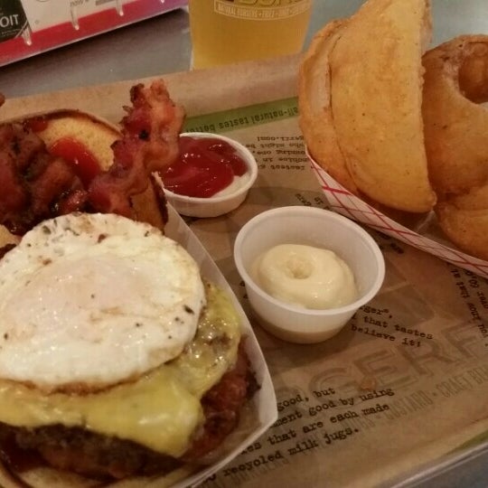 Photo taken at BurgerFi by Samantha V. on 8/20/2015