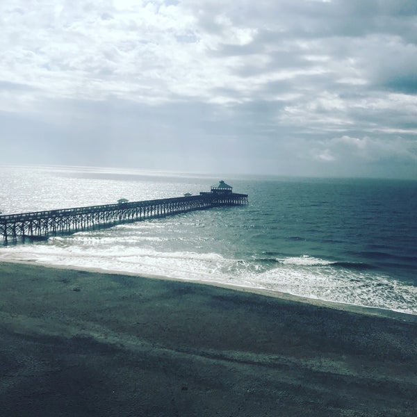 Photo taken at Tides Folly Beach by Lindsay S. on 3/19/2018