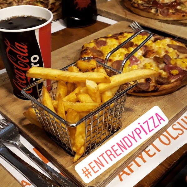 Photo taken at Trendy Pizza by Burçin Y. on 2/23/2018