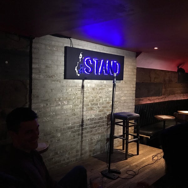 Photo taken at The Stand Restaurant &amp; Comedy Club by Chris S. on 6/1/2017