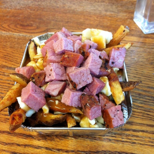Photo taken at 514 Poutine by Andrea L. on 5/10/2014