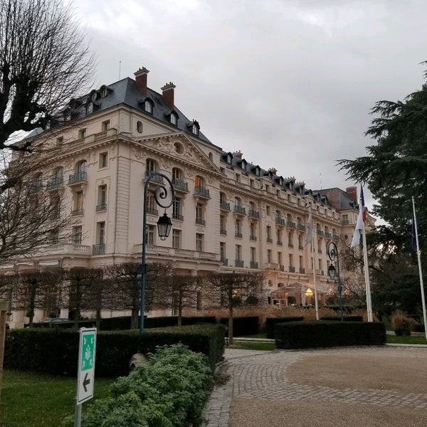 Photo taken at Waldorf Astoria Versailles - Trianon Palace by Reid L. on 1/19/2020