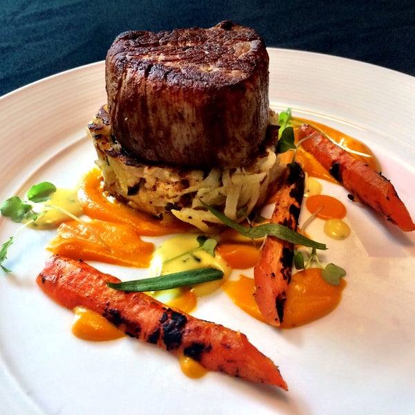 Our seared center-cut 6oz. filet mignon, served on a crisp bacon and chive potato pancake with buttery roasted baby carrots.