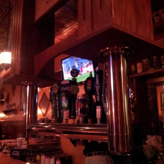 Photo taken at The Irish Penny Pub &amp; Grill by Bryan F. on 12/16/2012