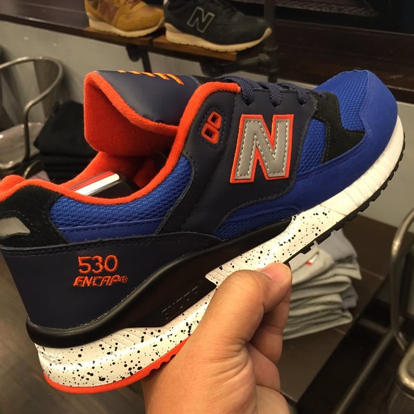 Photo taken at New Balance Flagship Store by Ryan R. on 10/16/2015