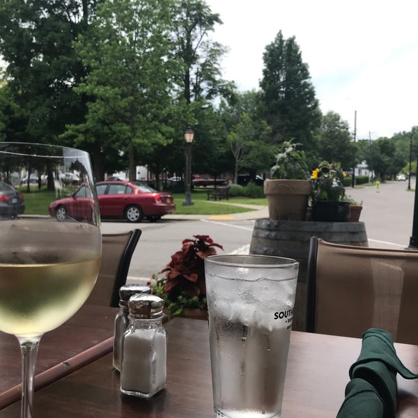 Foto diambil di Village Tavern Restaurant &amp; Inn oleh Bram D. pada 6/19/2019