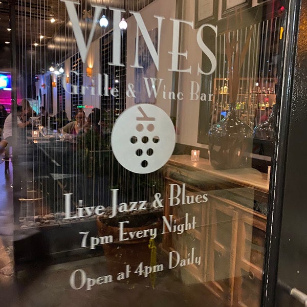 Photo taken at Vines Grille &amp; Wine Bar by Richard S. on 11/5/2019