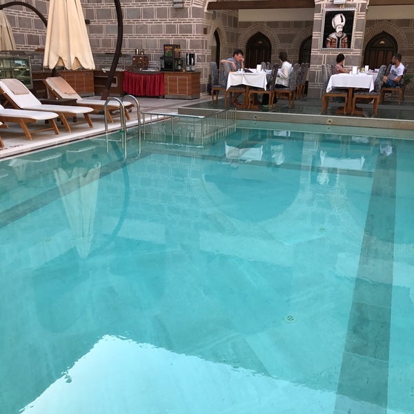 Photo taken at Kanuni Kervansaray Historical Hotel by Ali P. on 6/29/2017