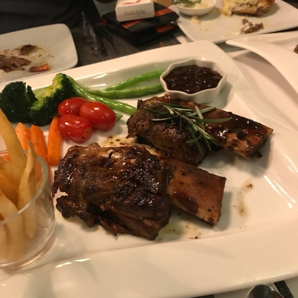 The slow-cooked beef ribs are amazing! A must-try!