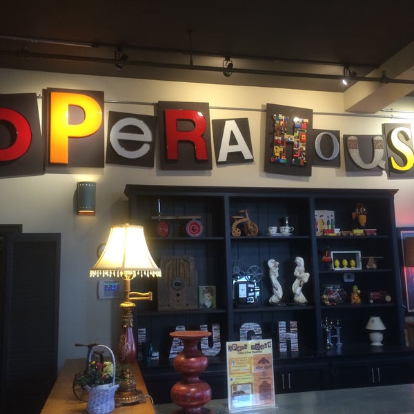 Photo taken at Opera House Coffee &amp;  Food Emporium by Spencer D. on 2/21/2015