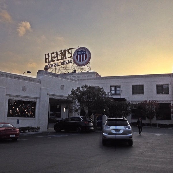 Photo taken at Helms Bakery District by Americo G. on 12/22/2013