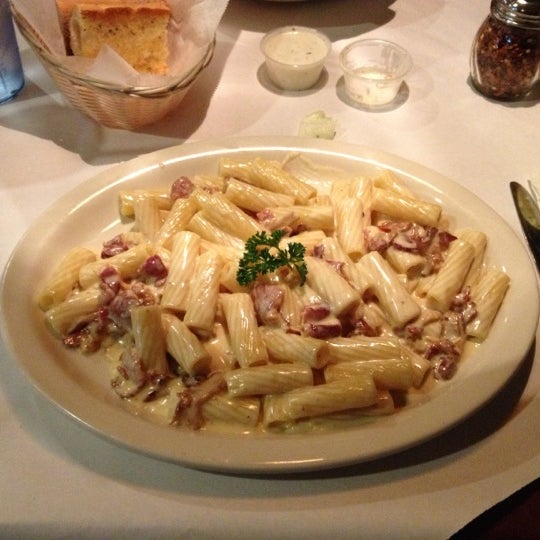 Photo taken at Mangia Italian Restaurant &amp; Pizzeria by Melissa H. on 10/18/2012
