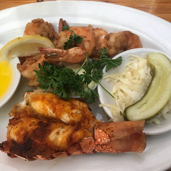Photo taken at Sammy&#39;s Fish Box Restaurant by Melissa C. on 6/17/2018