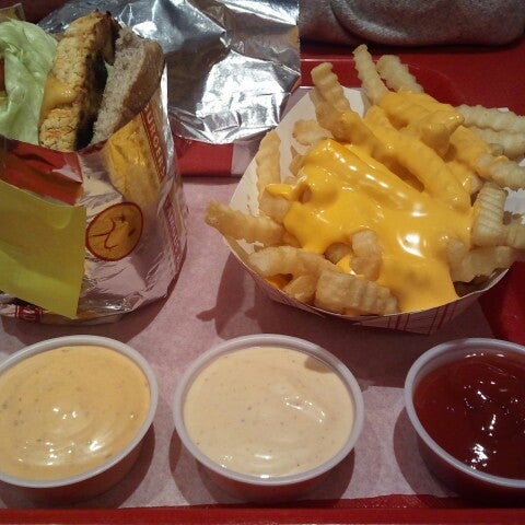 Photo taken at Lucky&#39;s Famous Burgers by Marina on 12/3/2012