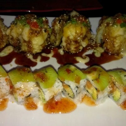 Photo taken at Red Koi Japanese Cuisine by Nick L. on 1/22/2013