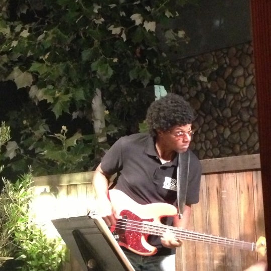 Photo taken at The Canyon Bistro &amp; Wine Bar in Topanga by Xtine W. on 8/3/2013