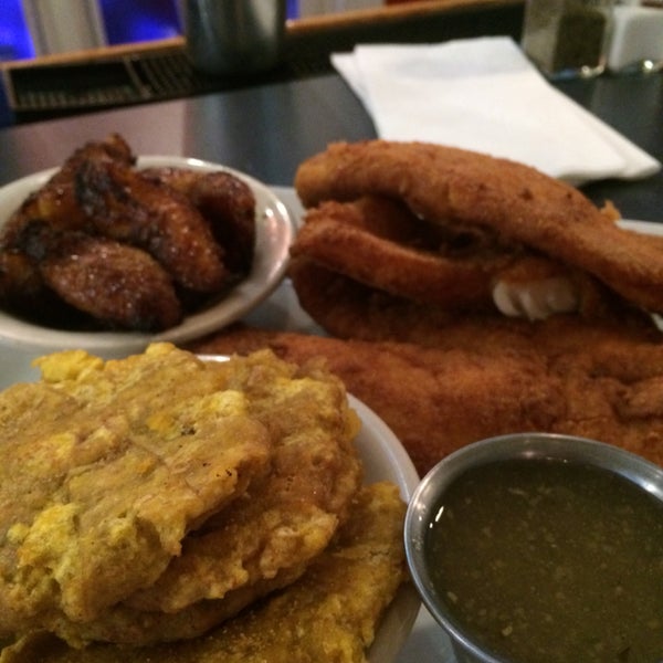 I tried the conch fritters and the fried tilapia with fried plaintains and tostones. Overall AWESOME, especially enjoyed the conch and tostones. The ambiance was cool too
