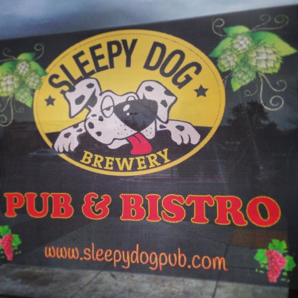 Photo taken at Sleepy Dog Pub &amp; Bistro by John H. on 1/24/2013