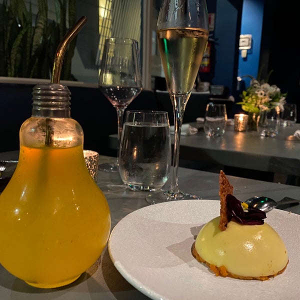 Modern gourmet spin on classic Indian flavors. Also a cocktail served in a light bulb!