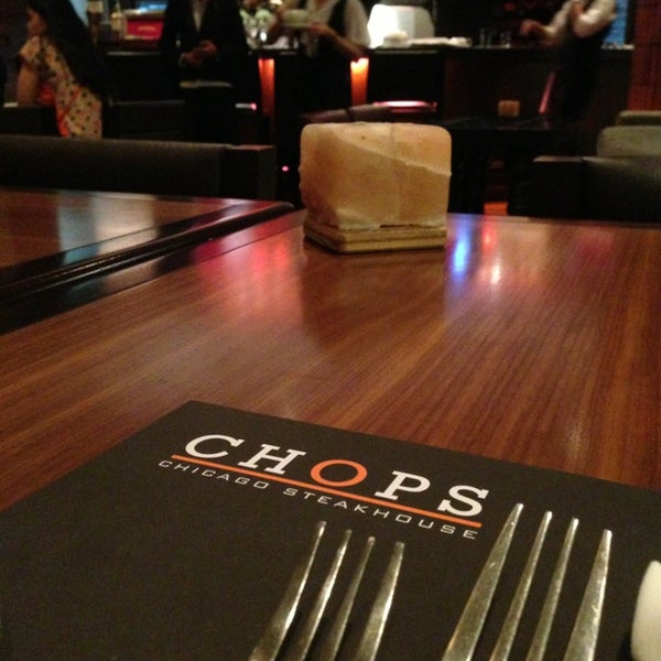 Photo taken at Chops Chicago Steakhouse by Chelsea T. on 1/11/2013