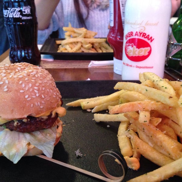 Photo taken at Burgerhood by Çağla G. on 2/27/2015
