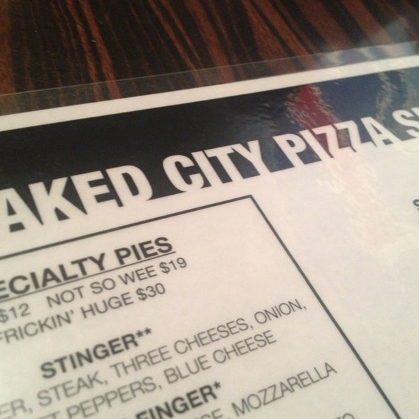 Photo taken at Naked City Pizza Shop by Jamie on 1/7/2013