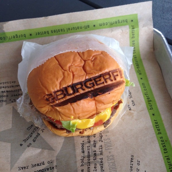 Photo taken at BurgerFi by Victoria on 1/9/2014