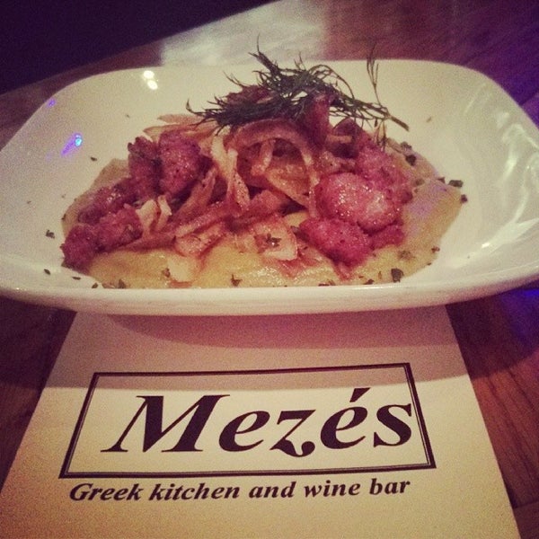 Снимок сделан в Mezes Kitchen &amp; Wine Bar пользователем Mezes Wine Bar &amp; Greek Kitchen m. 12/28/2013