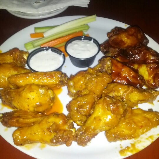 Photo taken at Chics N Wings by Reed G. on 1/12/2013