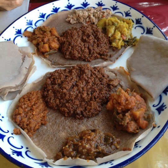 Photo taken at Aster&#39;s Ethiopian Restaurant by Ashley A. on 7/25/2012
