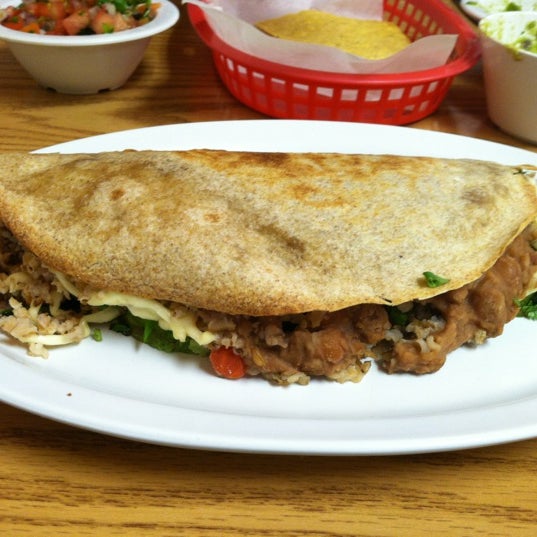 Photo taken at Leonor&#39;s Vegetarian Mexican Restaurant by Devon I. on 10/21/2012