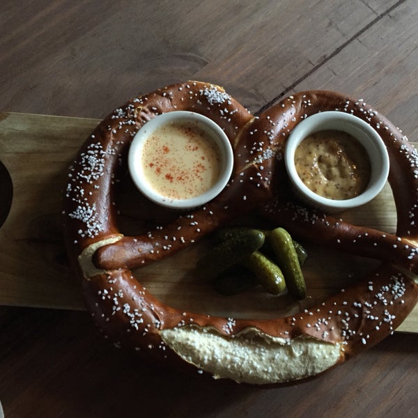 Great happy hour (4-8pm!) and very friendly bartenders. Cool vibe and awesome piano music later in the evening. The giant pretzel is the perfect snack to complement any drink.
