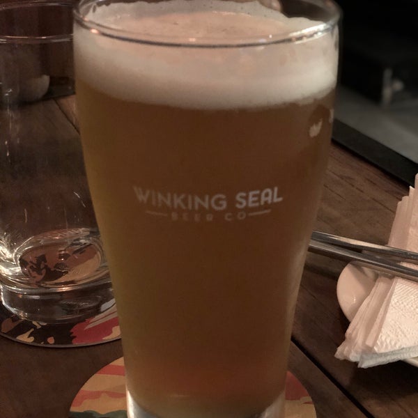 Photo taken at Winking Seal Beer Co. Taproom by Global H. on 11/16/2018