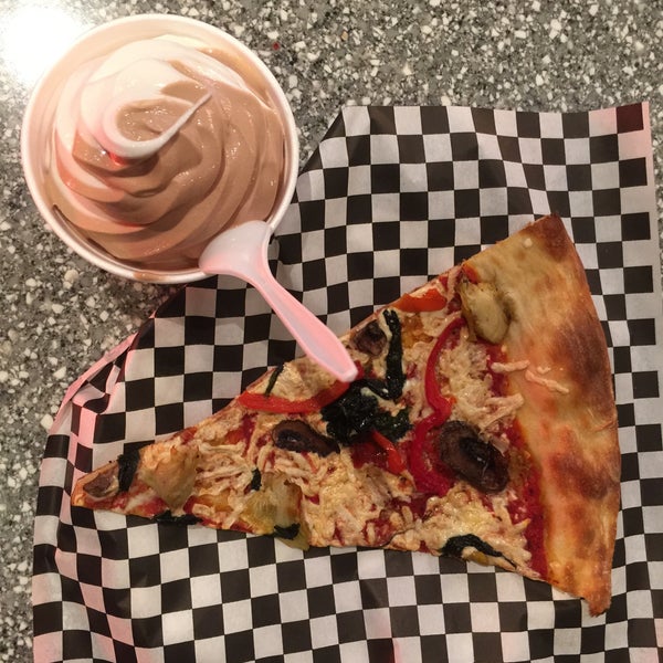 Photo taken at Pop Up Pizza by Geneva A. on 4/16/2015