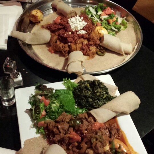 Photo taken at Lucy Ethiopian Restaurant &amp; Lounge by Nguyen T. N. on 10/27/2013