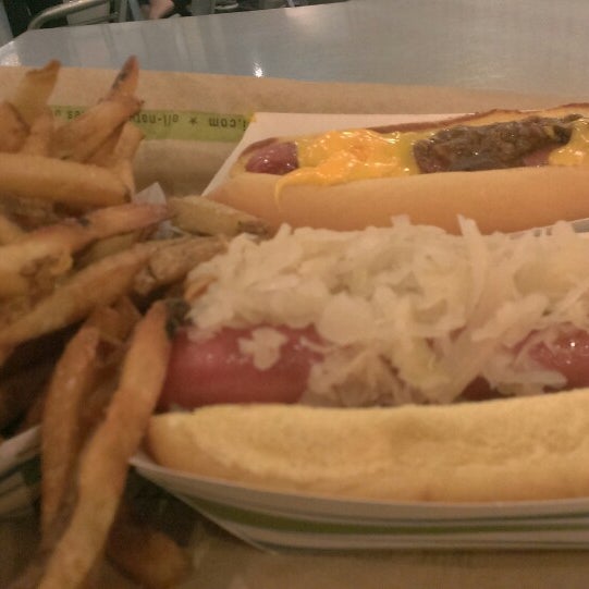 Photo taken at BurgerFi by V K. on 6/11/2014
