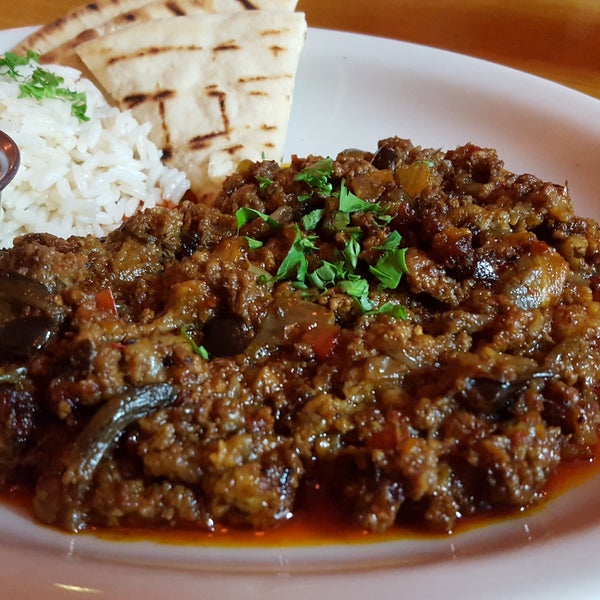 Try the Mussaka, rich and delicious eggplant and meat slow simmered. Not layered like the Greek version, instead served with rice, pita, and tzatziki. So good!
