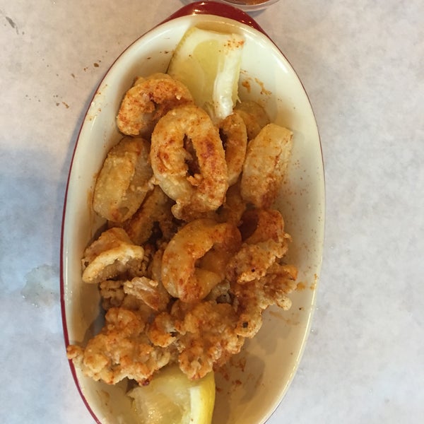 Calamari is tender and it has a little kick from the Cajun seasoning that lingers on the back of your throat. Very delicious. Not rubbery at all.