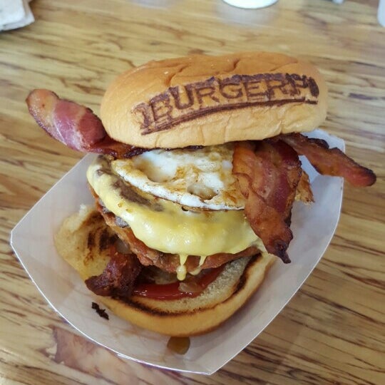 Photo taken at BurgerFi by Honey J. on 8/24/2015