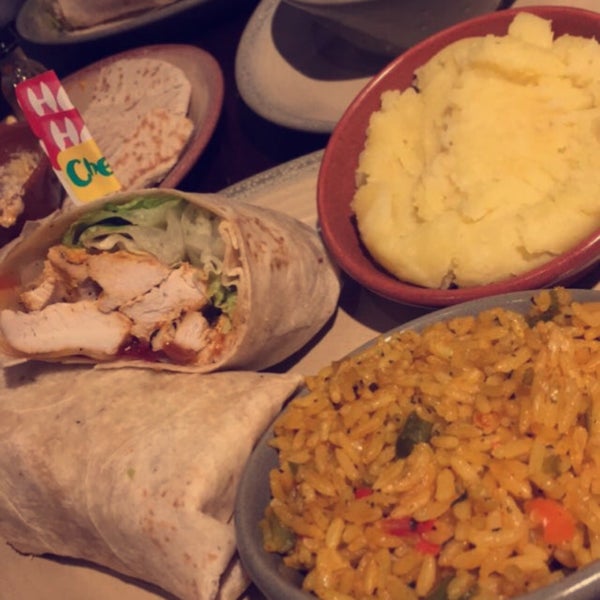 Double chicken wrap with cheese and chicken liver. Rice / mash potatoes or peri peri chips as sides 🤤🤤🤤🤤