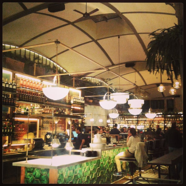 Stylish 'gourmet food court ' off Passeig de Gracia. Great decor. Choice of bars & restaurants serving meat, fish & tapas. Bit overpriced for portion size. Better for a glamorous drink.