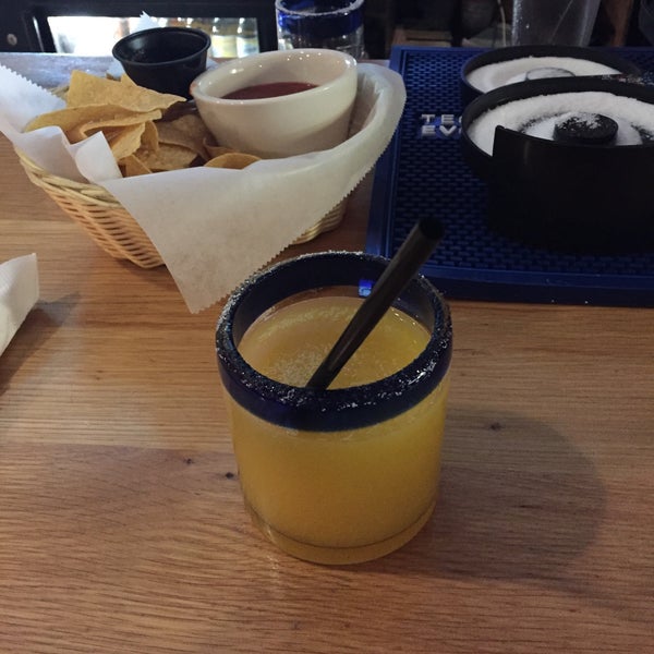 Frozen mango margarita and chips with salsa is a great way to start the night!