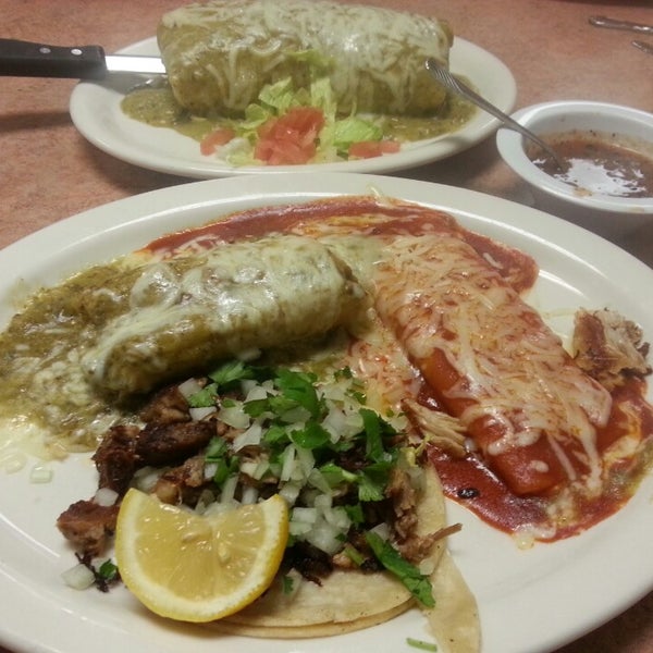 Photo taken at Genoveva&#39;s Fine Mexican Food &amp; Grill by Ernie E. on 1/17/2015