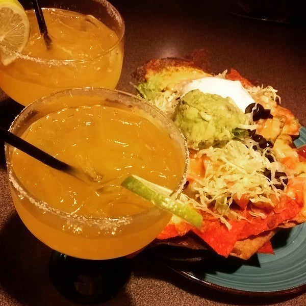 Photo taken at Sunset Cantina by Sunset Cantina on 2/25/2015